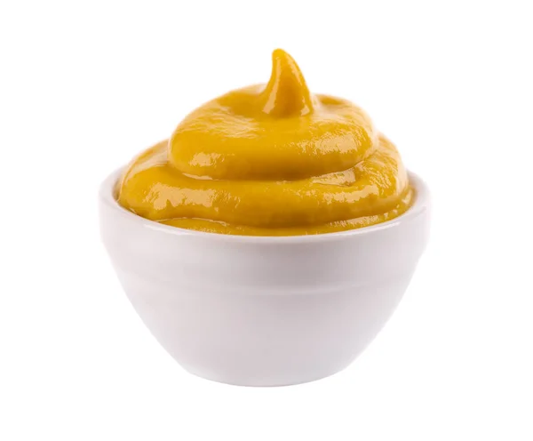 Molho de mostarda na tigela, isolado no fundo branco. Molho de salada de mostarda mel. — Fotografia de Stock
