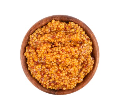 Tahta kasede tahıllı hardal sosu, beyaz arka planda izole. Hardal fasulyesi. Üst görünüm