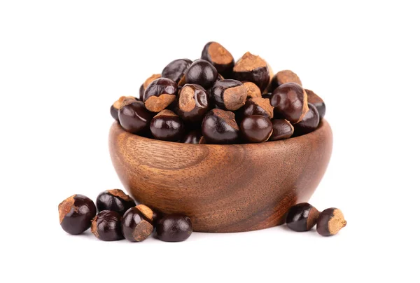 Semilla de guaraná en cuenco de madera, aislada sobre fondo blanco. Suplemento dietético guaraná, cancha de cafeína para bebidas energéticas. —  Fotos de Stock