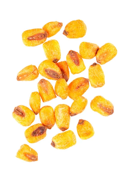 Roasted salted corn nuts isolated on white background. Beer snack, dry corn with spices. Top view. — Stock Photo, Image