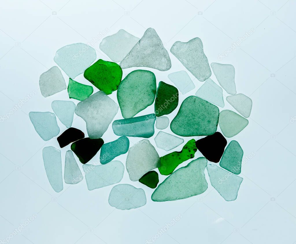 Random pieces of green and blue sea glass