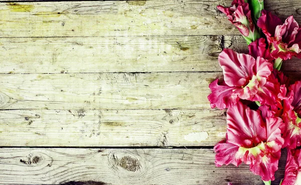 Flowers on rustic wooden planks