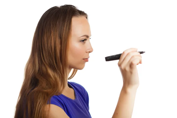 Young woman drawing on whiteboard with white copy-space — Stock Photo, Image