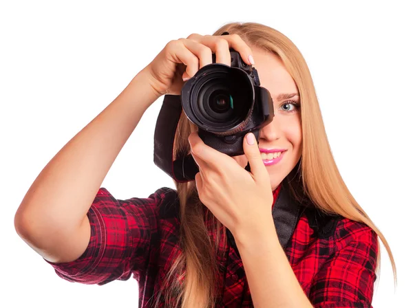 Attractive female photographer holding a professional camera - i — Stock Photo, Image