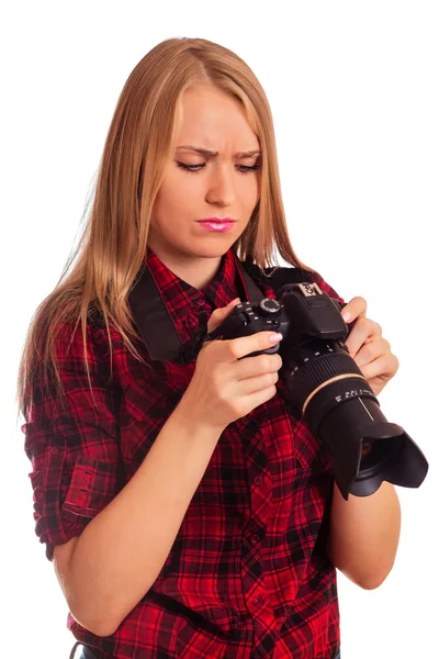 Glamour woman photographer looking unhappy at the screen of her — Stock Photo, Image