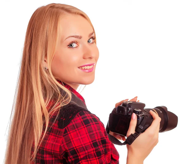 Vrouw fotograaf draai rond tijdens het fotograferen - geïsoleerd op whit — Stockfoto