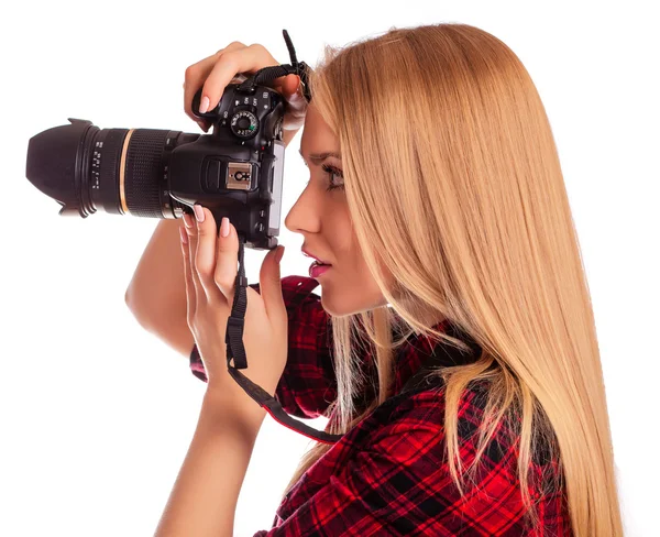 Гламурная женщина-фотограф делает снимки - изолированные на белом Лицензионные Стоковые Фото
