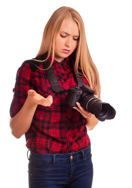 Женщина-фотограф имеет проблемы с камерой - изолированы на белом Лицензионные Стоковые Изображения