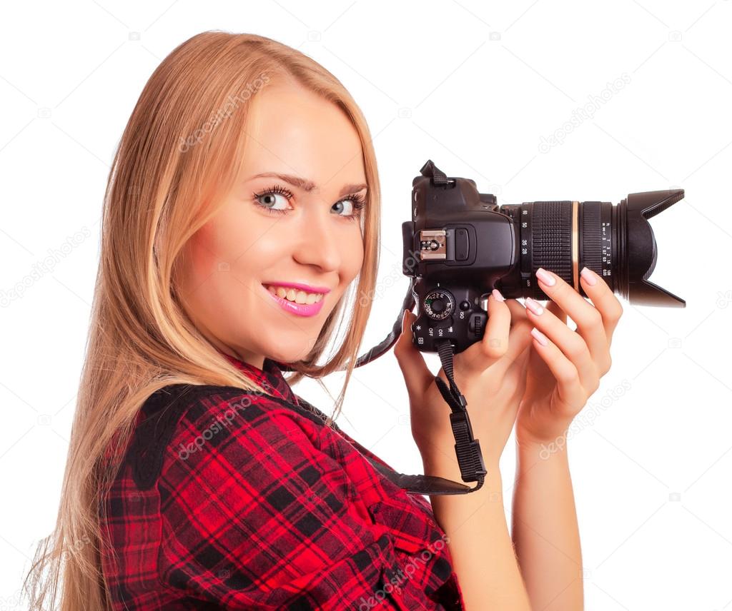 Glamour amateur photographer holding a professional camera - iso