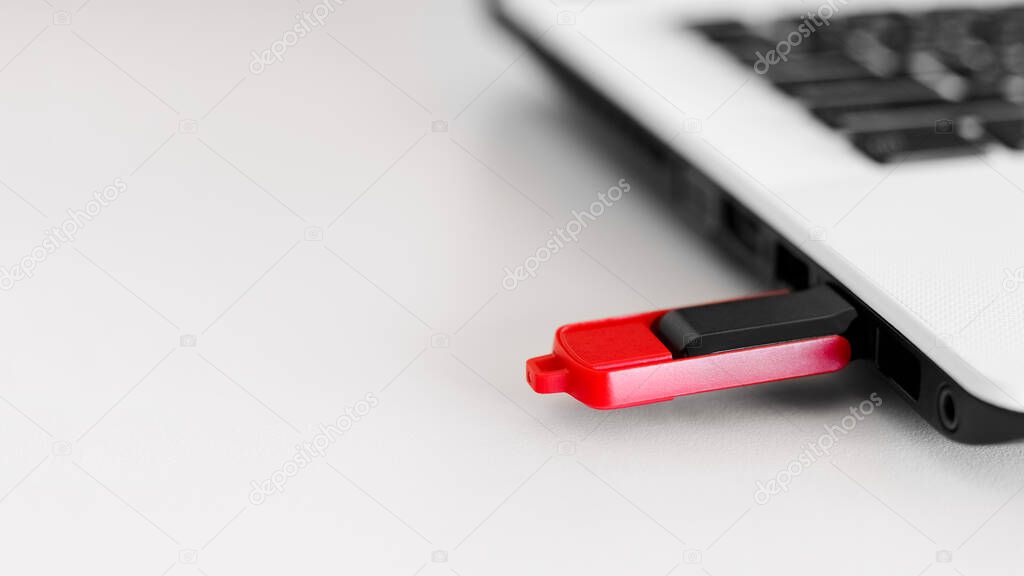USB flash memory connected to laptop.