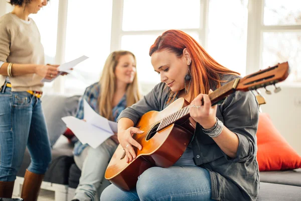 Home band learning new song together