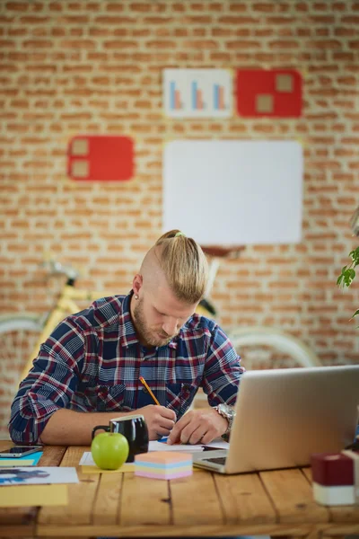 Businessman at work in modern office — Stock Photo, Image