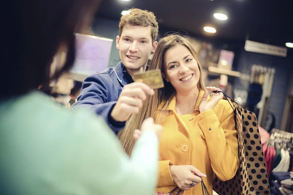 Couple in a boutique — Stock Photo, Image