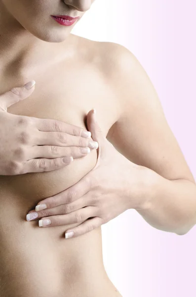 Woman and hand breast test — Stock Photo, Image