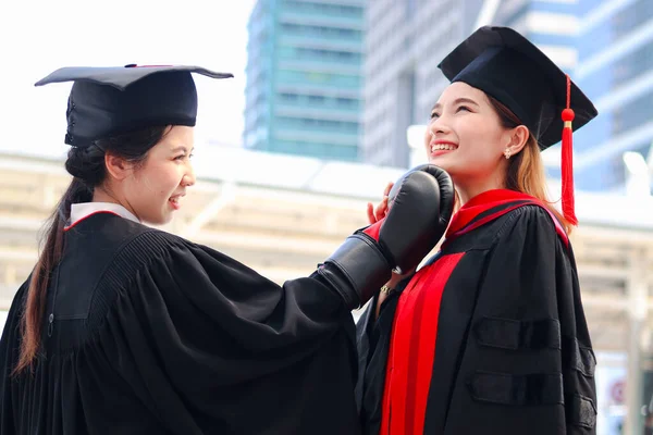 Two Happy Graduated Women Students Warming Square Academic Hat Cap — Stock Photo, Image