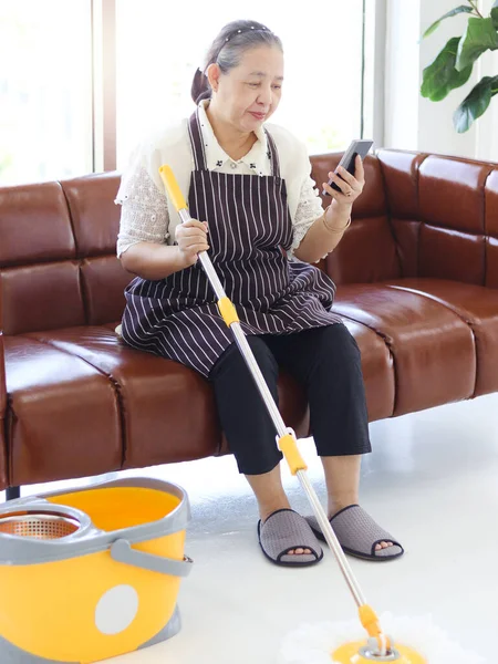 Happy Asian Senior Woman Housewife Holding Mop Cleaning Floor Using — стоковое фото