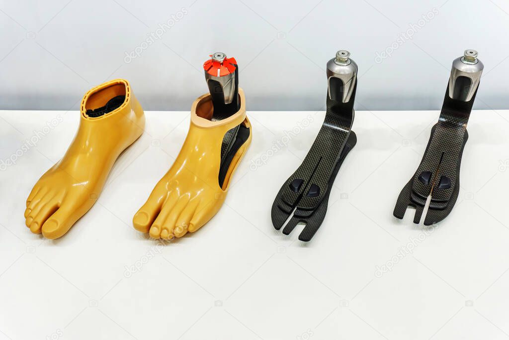 Artificial feet made of plastic and high-strength carbon fiber. Modern technology for prosthetic limbs. A range of products for people with disabilities