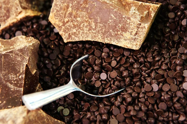 Chocolate granules at a confectionery factory. Ingredient for a culinary dish. Close-up