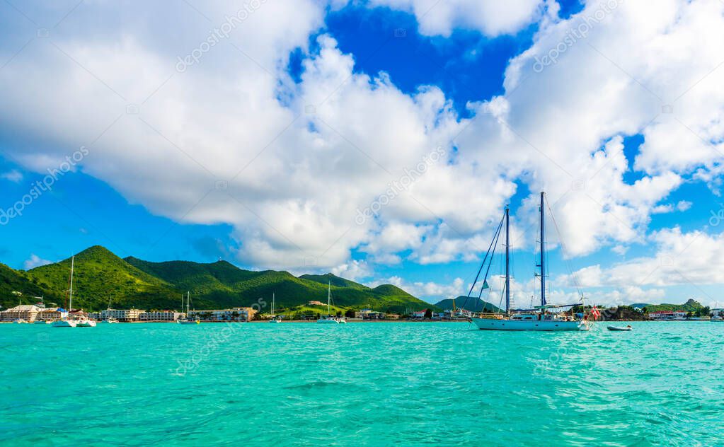 Boats at anchor near the coast of the island of Saint Martin in the Caribbean