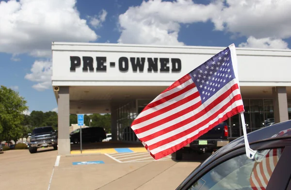 Pre Owned Car Dealership American Flag — Stock Photo, Image