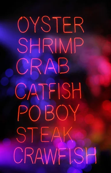 Bokeh 'le Neon Deniz Ürünleri Restoranı Tabelaları — Stok fotoğraf