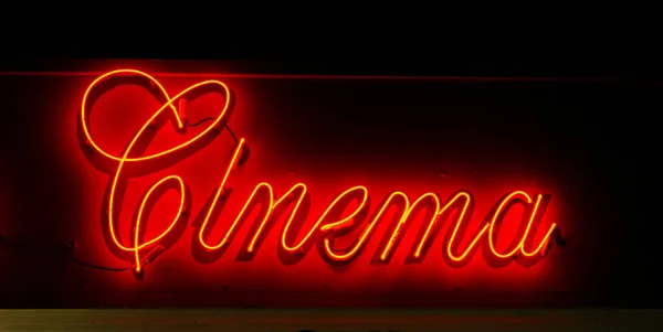 Vintage Red Neon Cinema Sign — 스톡 사진