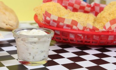 Fried Catfish With Tartar Sauce and French Fries