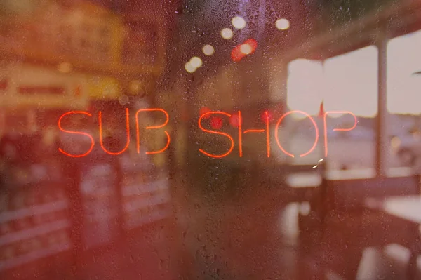 Neon Rainy Window Blur Image Sub Shop Neon Sign — Stock fotografie