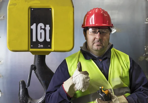 Operator and hook of construction crane. — Stock Photo, Image