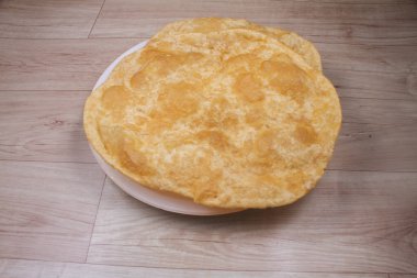 Geleneksel Kuzey Hindistan fast food 'u olan Bhaatura ya da Bhature kahvaltıda, öğle ve akşam yemeklerinde tercih edilir..
