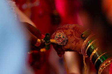 Brides hands with ring showing. indian wedding. clipart