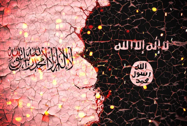 Isis ve Taliban bayrakları çatlamış beton duvarların üzerine boyanmış. Arkadaki lav akıntıları. ISIS - Taliban Savaşı.