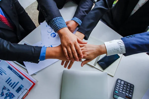 soft Focus,A group of businessmen are handshake together to show the symbol of congratulations that the deal has been completed. Handshake concept to show symbols in contract agreements