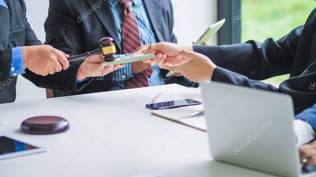 When the court authority receives money from businessmen in exchange for help Causing the decision to be unjustified is considered fraud and taking bribes. The concept of bribery of officials