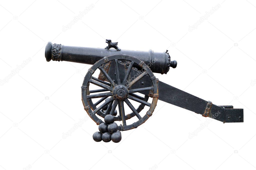 An ancient cannon with cores. Isolated on white. Ancient weapon. Ancient ship cannon. Cannon with cores.