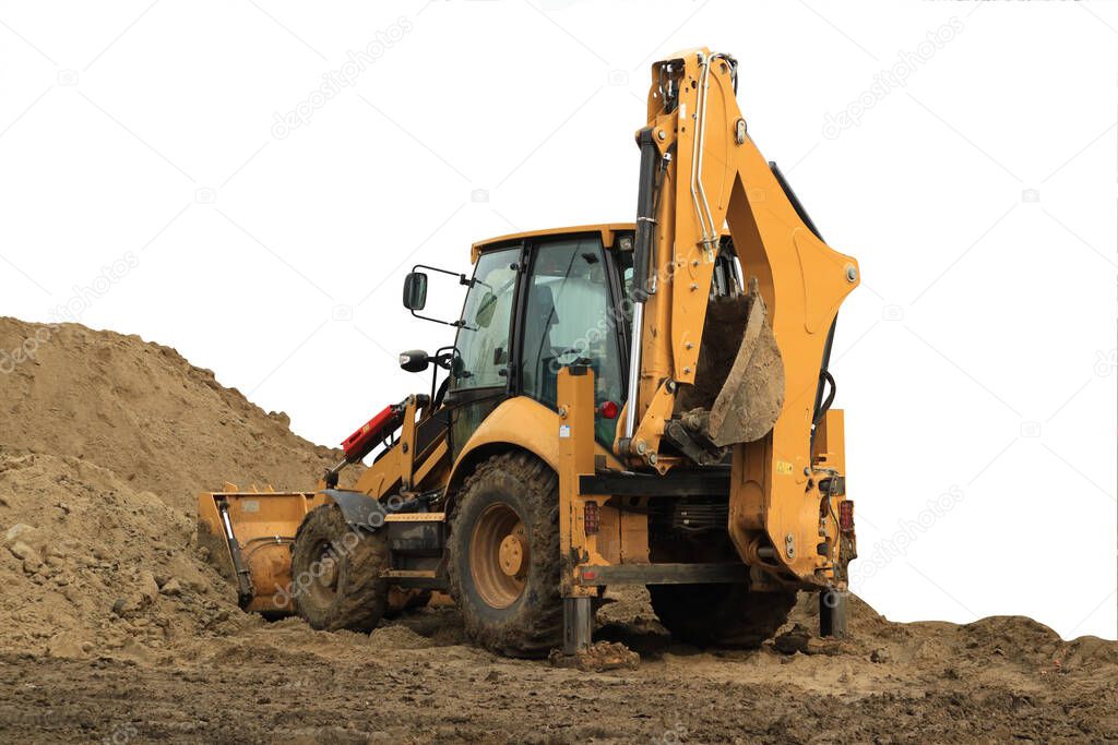 A bulldozer is digging sand. Isolated on white