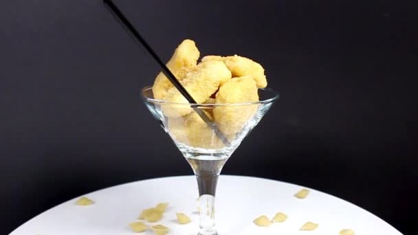 Glass Cocktail Glass Containing Nuggets Pasta Drinking Straw Creative Still — Stock Video