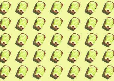 Dilimlenmiş avokadolu bir sandviç deseni. Yazdırma, şablon.