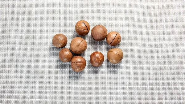 Nueces Redondas Macadamia Primer Plano Cáscara Vista Superior — Foto de Stock