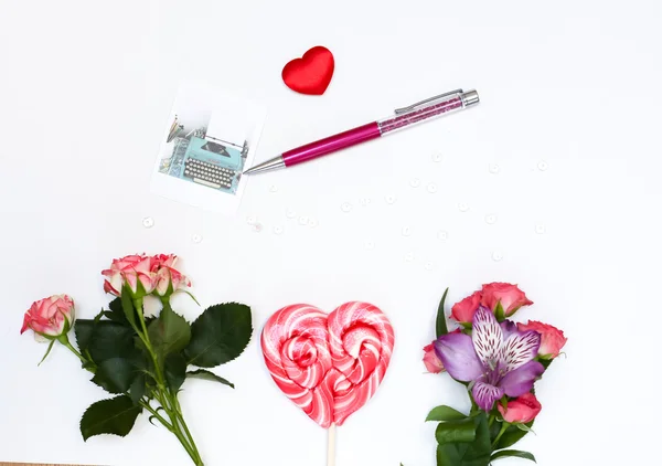 Composition with makeup cosmetics, pen, card and flowers on white background — Stock Photo, Image