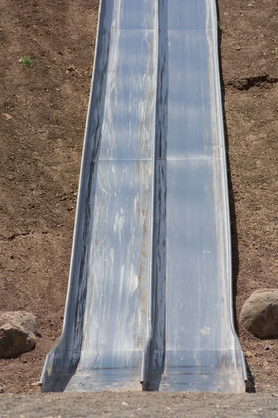 Long Steep Metal Slide Outdoors — Stock Photo, Image