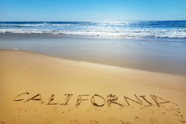 California bir plaj kum üzerine yazılmış