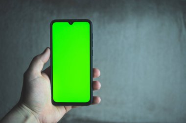 Yeşil ekranlı akıllı telefon. Cep telefonu çerçevesiz tasarım şablonu.