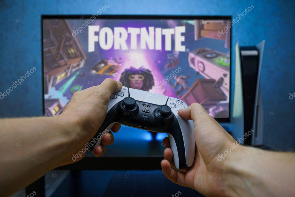 Fortnite video game on new generation Sony Playstation 5 video console. Point of view shot.