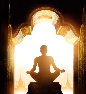 Woman was meditating at the gold sanctuary arch in the morning clipart