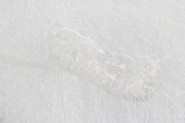 Huella humana en suelo de cemento blanco — Foto de Stock