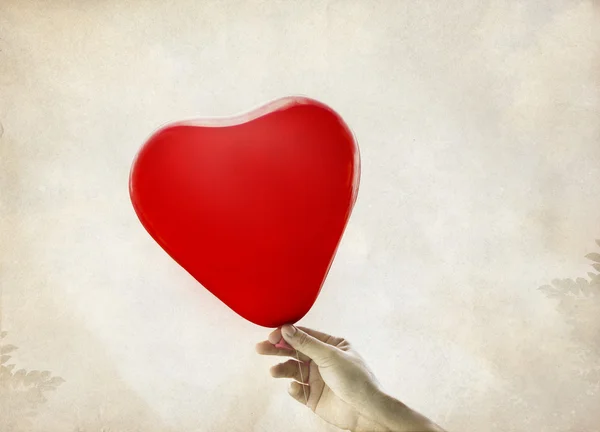 Red heart balloons in the vintage background — Stock Photo, Image