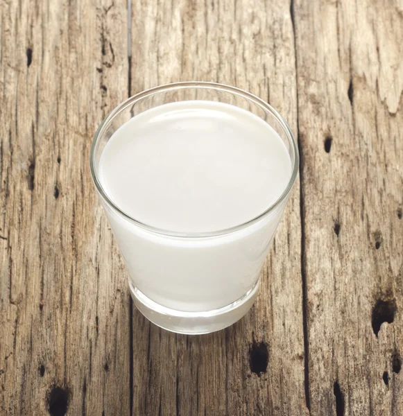 Fresh milk on old wood background — Stock Photo, Image