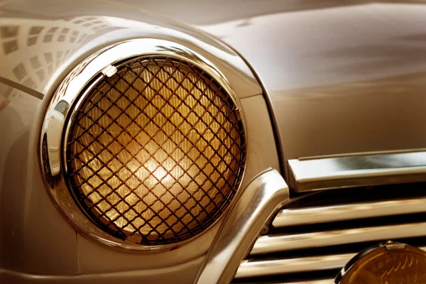 Faro abstracto clásico color vintage coche, concepto suave y borroso — Foto de Stock