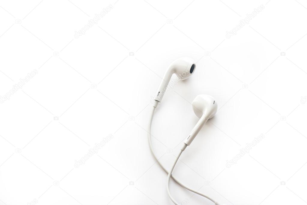 white earphones on white background, blank text